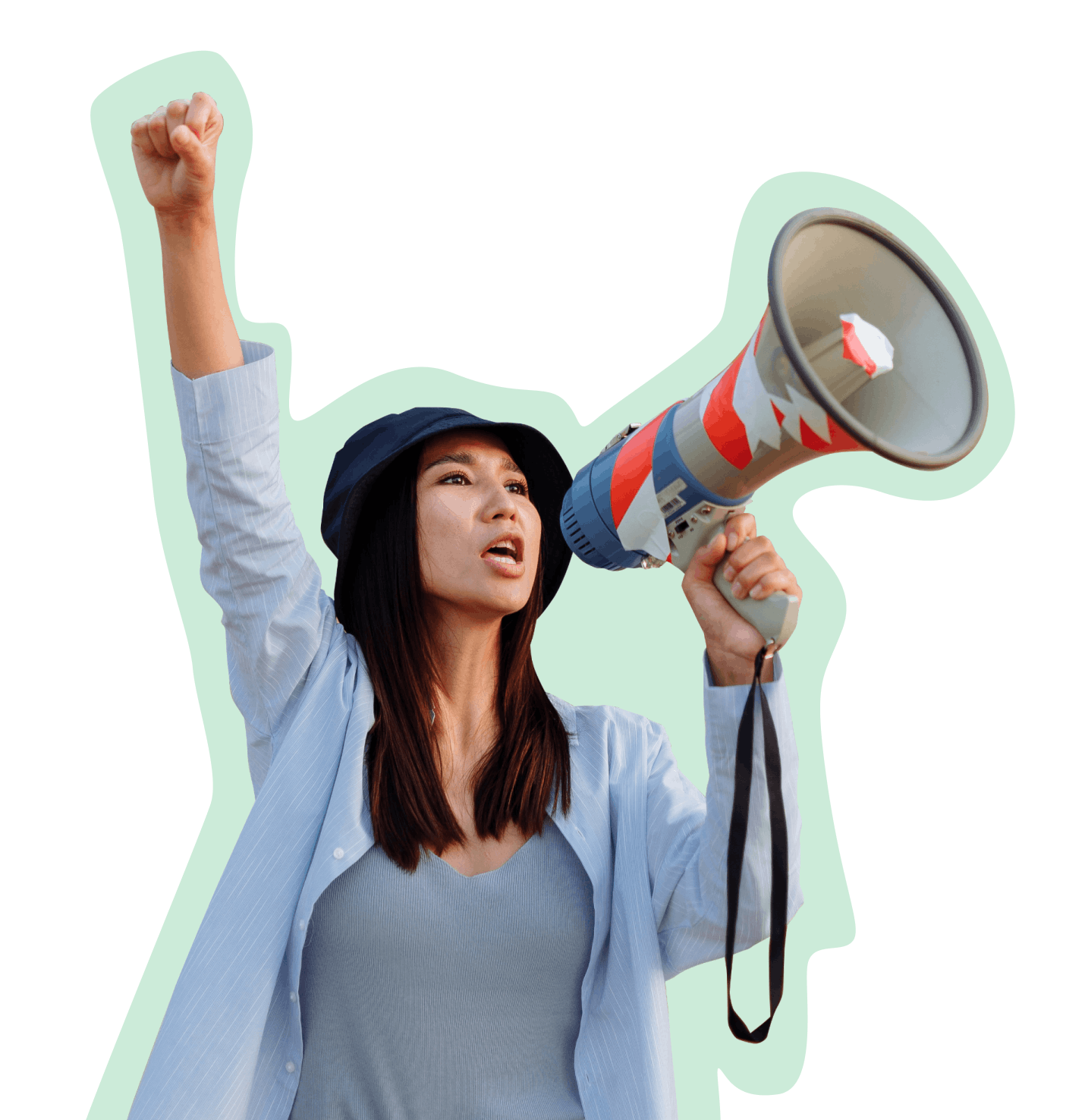 Woman yelling into a megaphone and raising her right fist into the air